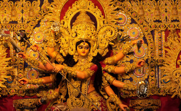 Goddess Durga idol decorated at puja pandal in Kolkata, West Bengal, India. Durga Puja is biggest religious festival of Hinduism and is now celebrated worldwide.